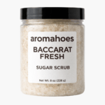 Jar of aromahoes Executive Prime Sugar Scrub with a creamy, granular texture and minimalist white label.