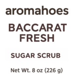 Product label for aromahoes Baccarat Fresh Sugar Scrub, featuring a minimalist white design and bold scent name.